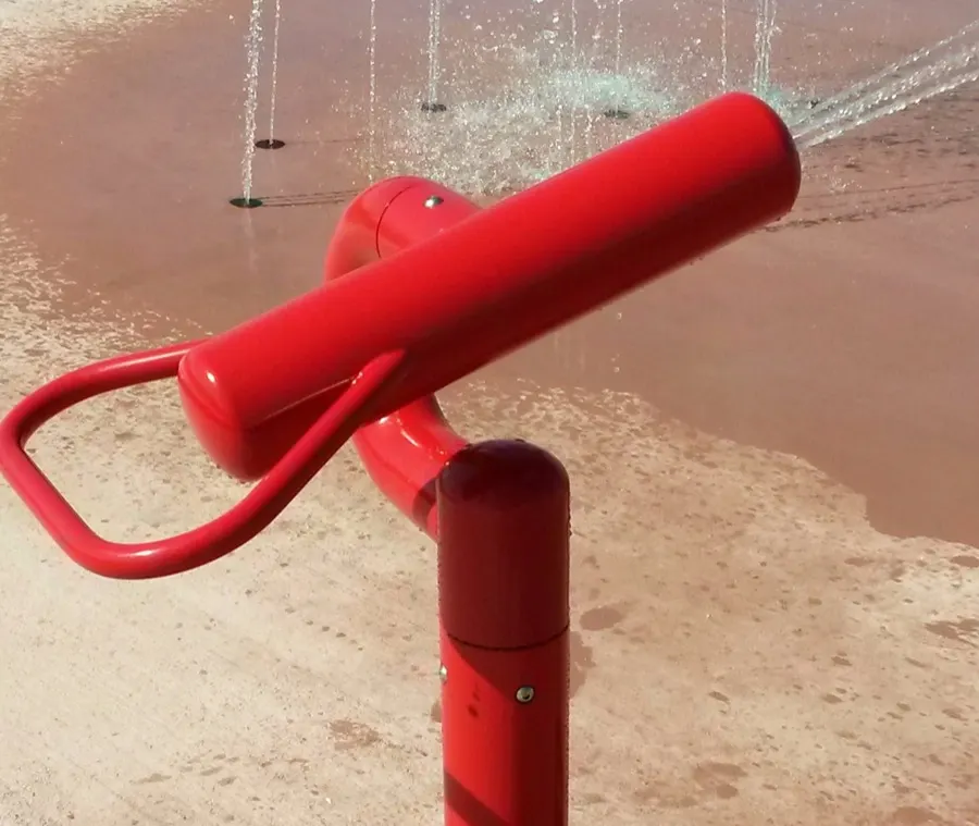 Red water cannon splash pad feature